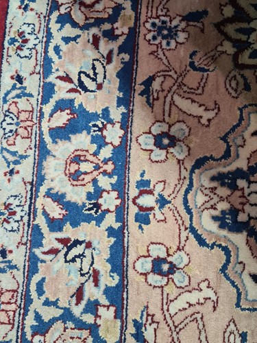 Lot 186 - A 20th-century dark blue ground Kashan carpet...