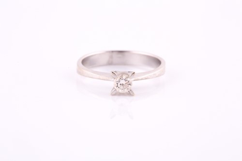 Lot 610 - A single stone diamond ring by Hamilton and...