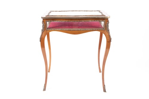 Lot 209 - A Louis XV style mahpgany cartouch topped...