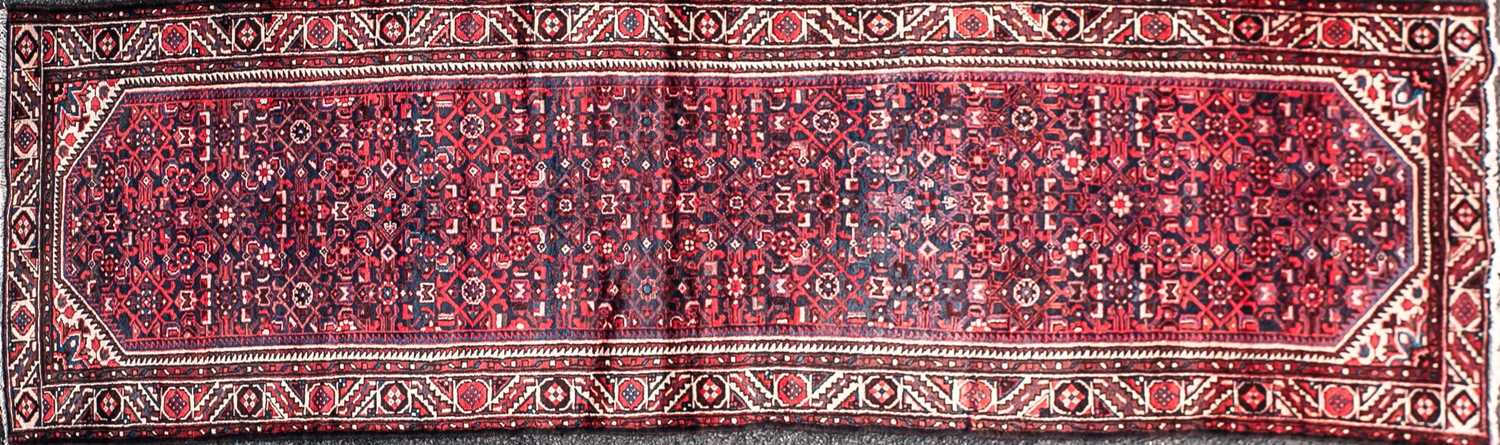 Lot 101 - North West Persian blue ground long rug/...