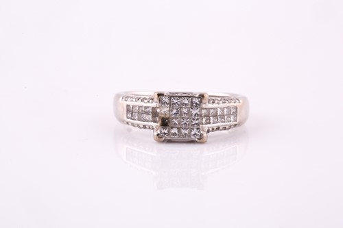 Lot 641 - A diamond dress ring The 18ct white gold band...