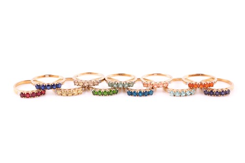 Lot 393 - A collection of gem-set rings Each set with...