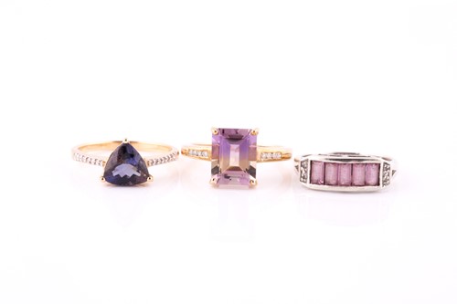 Lot 634 - Three gem-set rings Each set with vari-cut...