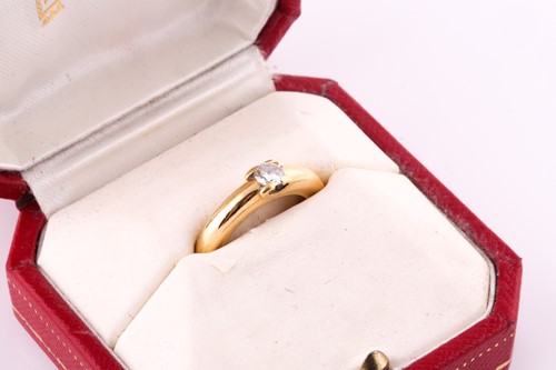 Lot 625 - A diamond single-stone ring by Cartier The...