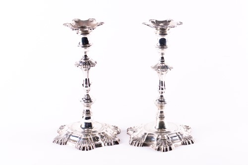 Lot 814 - A matched pair of George II hollow cast silver...