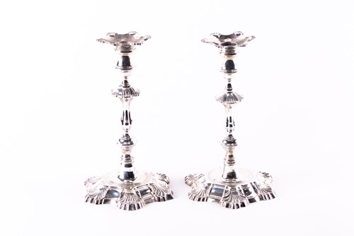 Lot 814 - A matched pair of George II hollow cast silver...