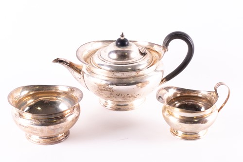 Lot 762 - A George V three-piece silver teaset,...