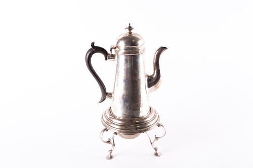 Lot 824 - An Edwardian silver coffee pot on stand, with...