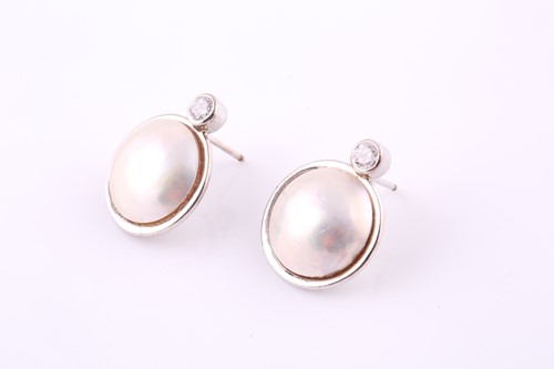 Lot 30 - A pair of mabe pearl and diamond earrings Each...