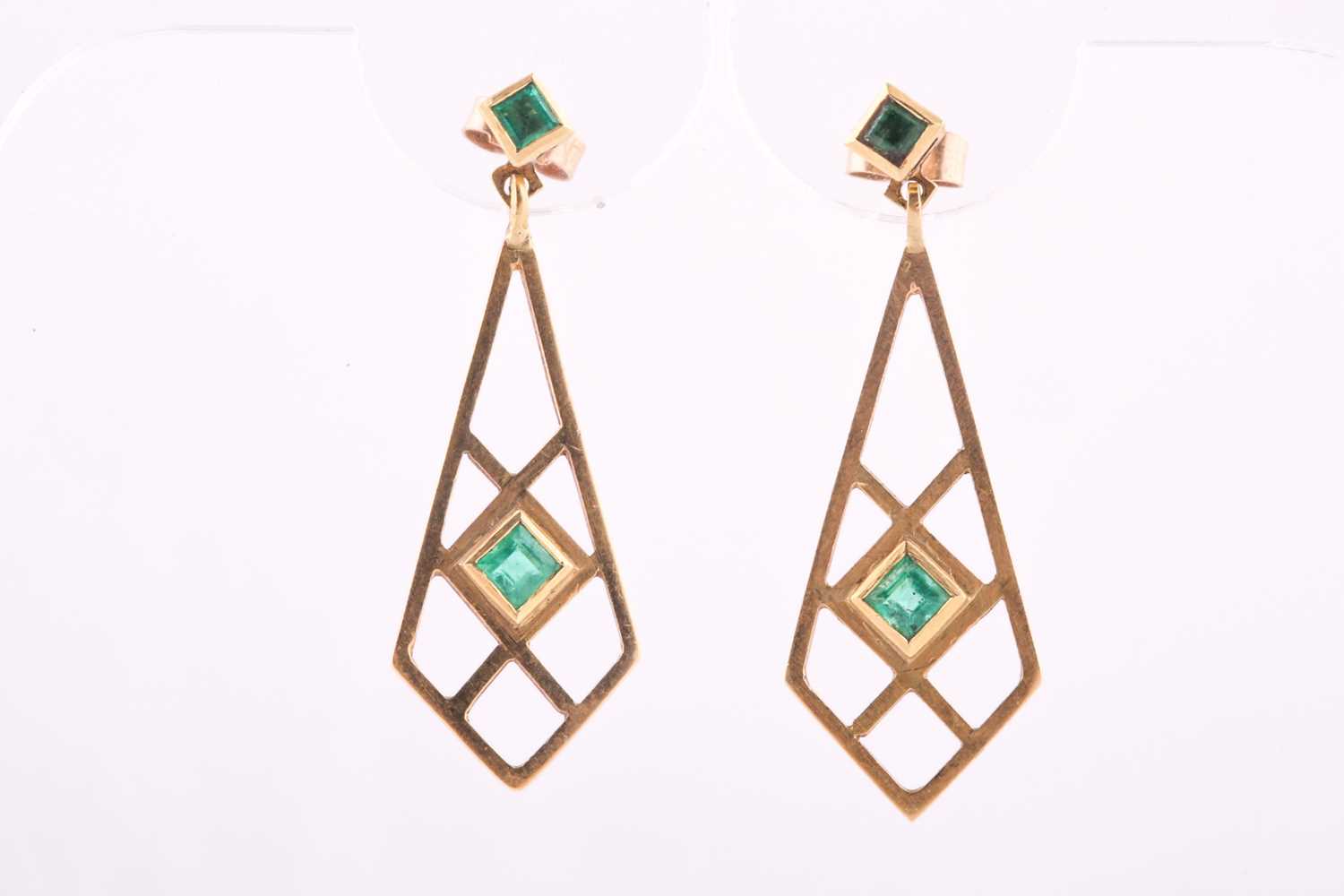 Lot 360 - A pair of emerald-set earrings,each collet-set...