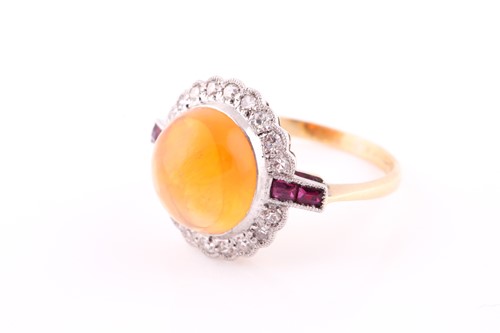 Lot 551 - An Art Deco opal, ruby and diamond ring,of...