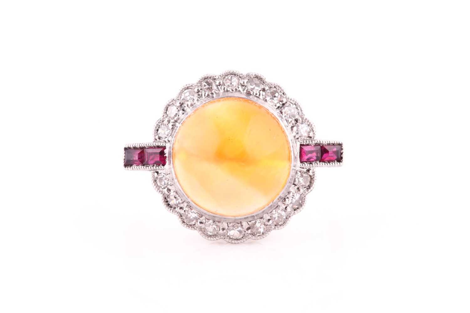 Lot 551 - An Art Deco opal, ruby and diamond ring,of...