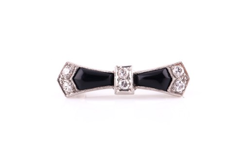 Lot 450 - An Art Deco diamond and onyx bow brooch, of...