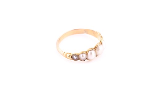 Lot 676 - A Georgian pearl ring Set to the front with...