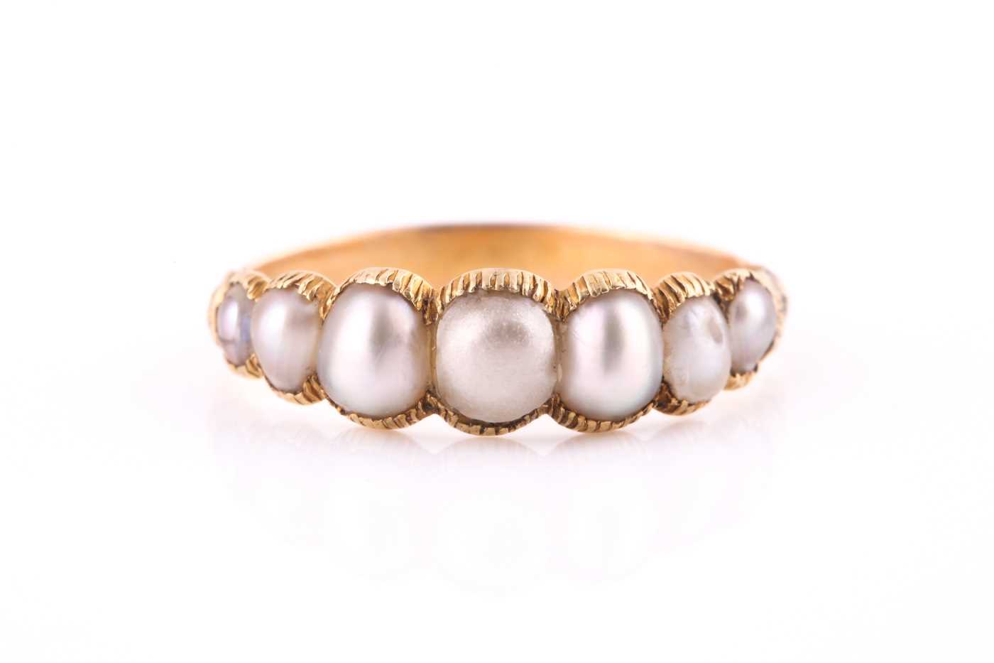 Lot 676 - A Georgian pearl ring Set to the front with...