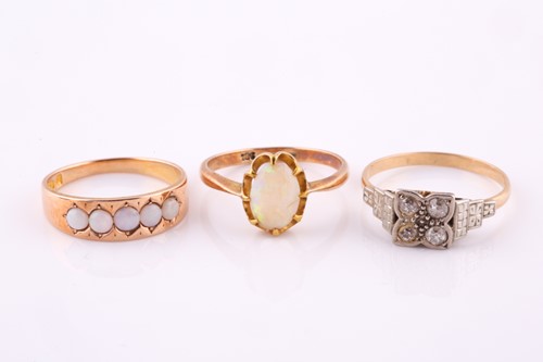 Lot 464 - A collection of opal and diamond-set rings...