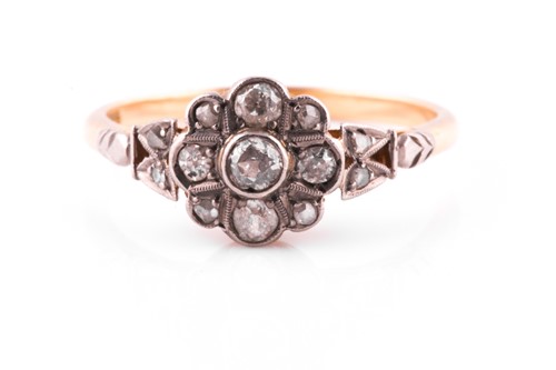 Lot 613 - A diamond cluster ring Designed as a...