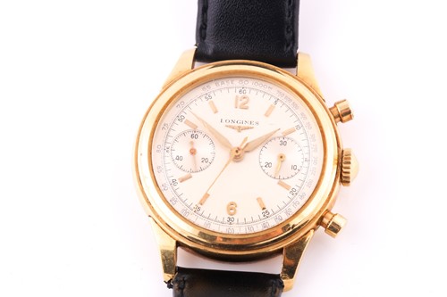 Lot 739 - A gentleman's 18k yellow gold Longines Flyback...