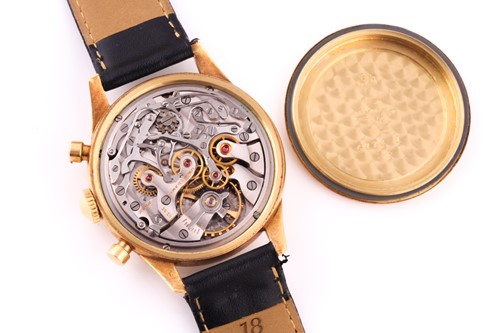 Lot 739 - A gentleman's 18k yellow gold Longines Flyback...