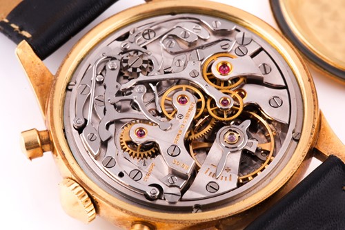 Lot 739 - A gentleman's 18k yellow gold Longines Flyback...