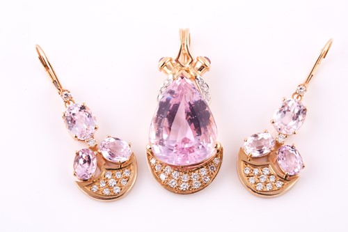 Lot 619 - A morganite and diamond pendant, the pear...