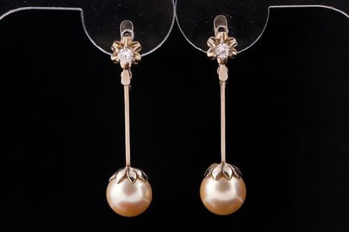 Lot 694 - A pair of cultured pearl and diamond drop...