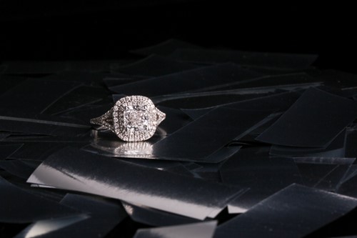 Lot 485 - A diamond cluster ring, with central modified...