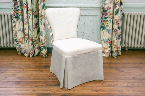 Lot 101 - A contemporary fabric covered side chair with...