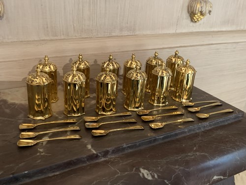 Lot 131 - A set of twelve silver gilt pepperettes by...