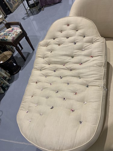 Lot 15 - An French style deep button upholstered...