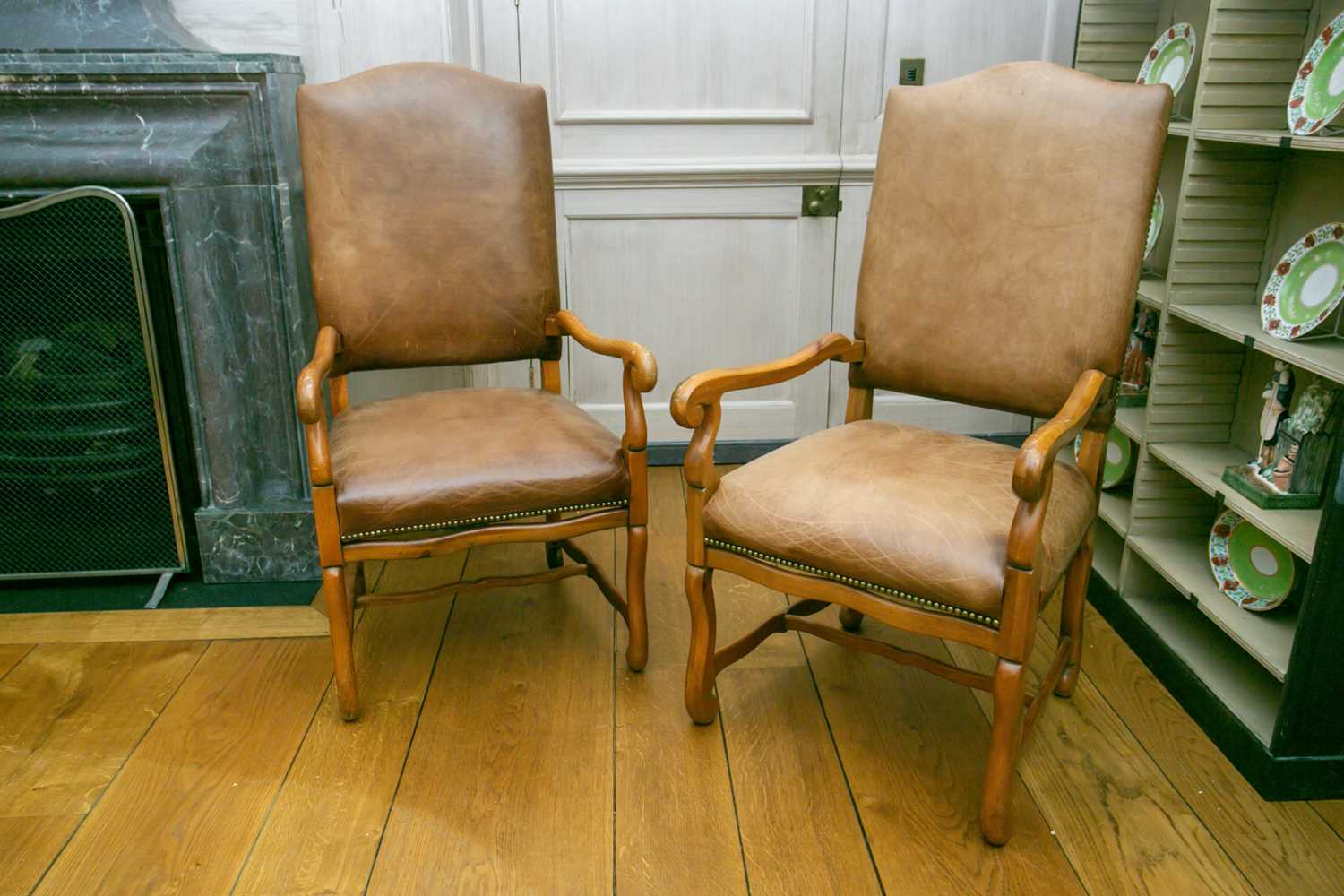 Lot 73 - A pair of French Regence style pine throne...