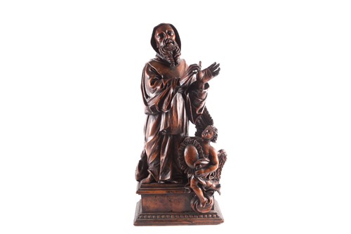 Lot 210 - An 18th-century Continental carved hardwood...