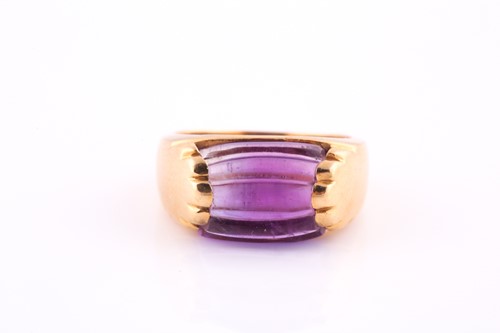 Lot 675 - An amethyst ring by Bvlgari The reeded and...