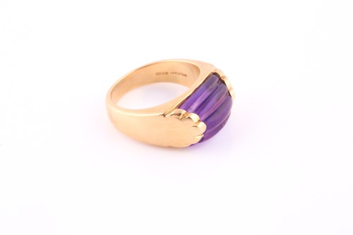 Lot 675 - An amethyst ring by Bvlgari The reeded and...
