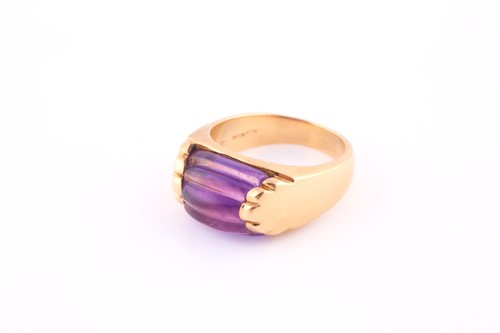 Lot 675 - An amethyst ring by Bvlgari The reeded and...