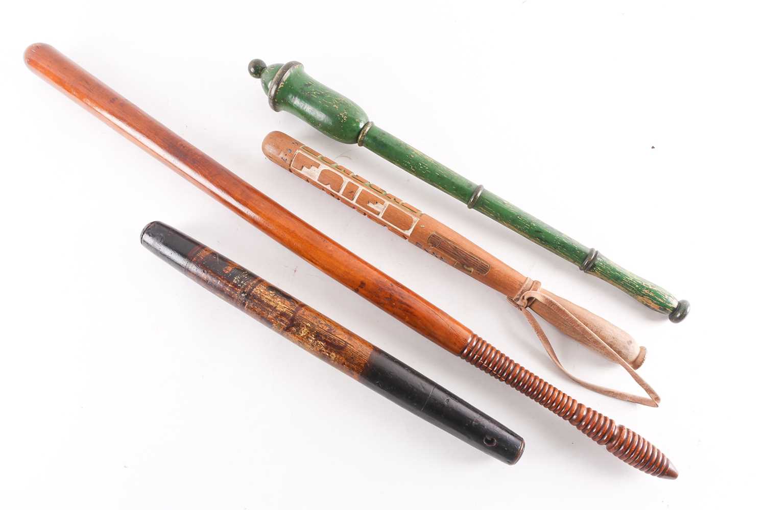 A collection of four 19th century and later truncheons Barnebys