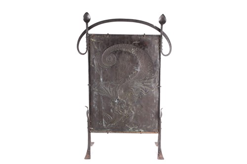 Lot 208 - An Arts & Crafts style fire screen, with a...