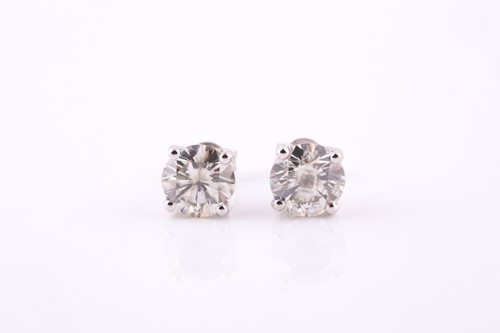 Lot 583 - A pair of diamond earstuds Each brilliant-cut...