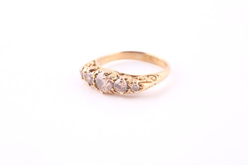 Lot 435 - A five-stone diamond ring Set to the front...