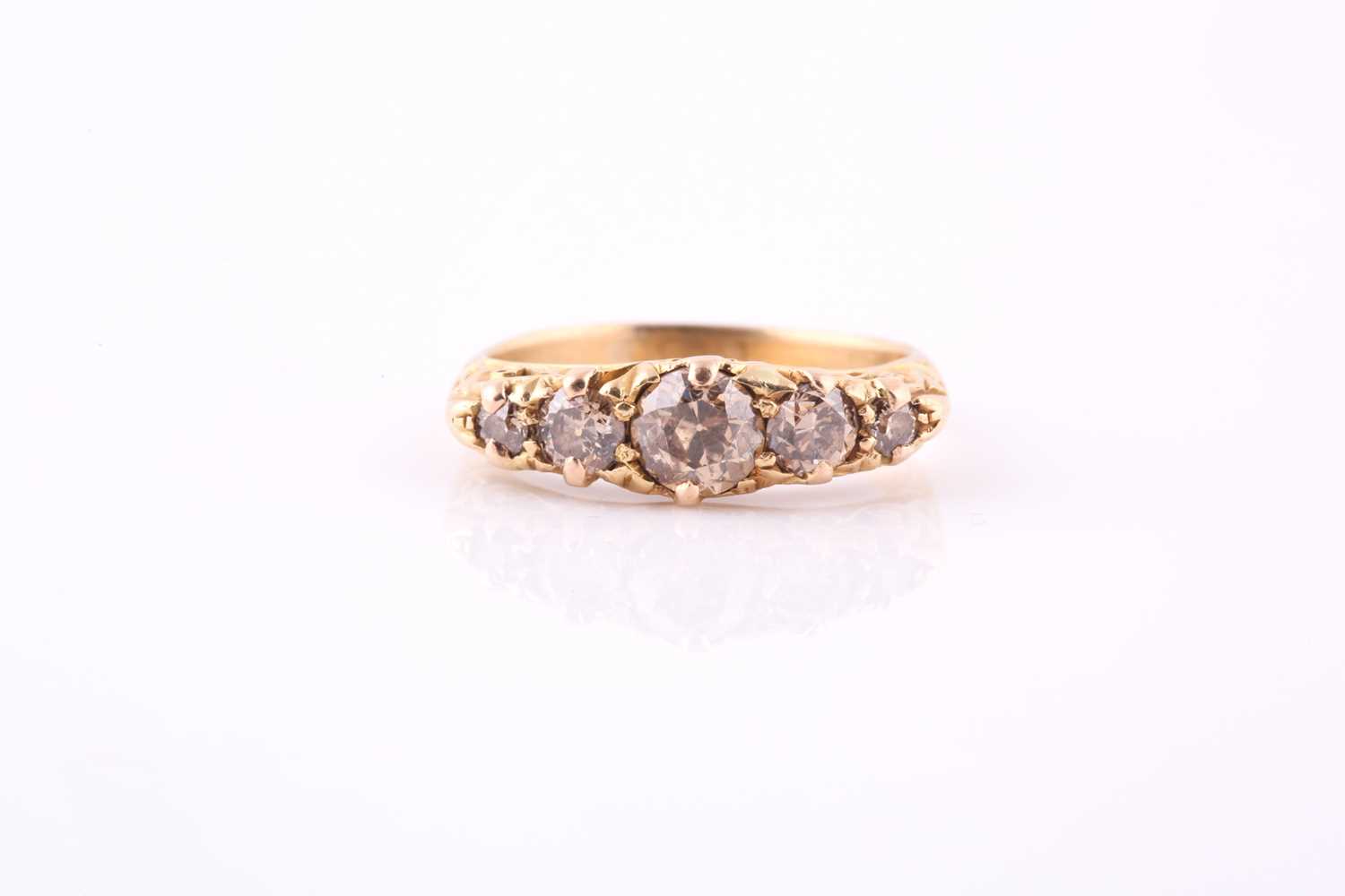 Lot 435 - A five-stone diamond ring Set to the front...