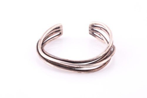 Lot 325 - A bangle by Georg Jensen Composed of four...