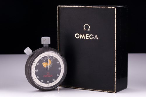 Lot 722 - An Omega stopwatch, the 52mm black and white...