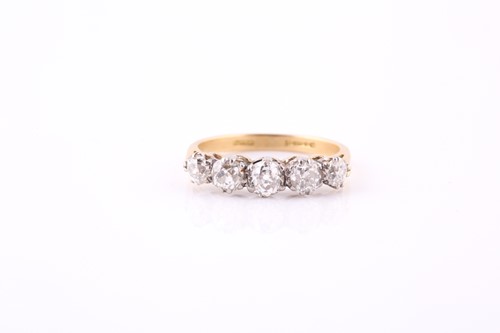 Lot 432 - A diamond five-stone ring Set to the front...