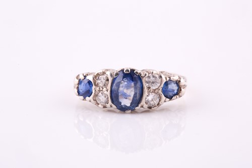 Lot 686 - A sapphire and diamond ring, three oval...