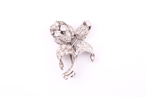 Lot 697 - A diamond floral spray brooch, 1930s, the...