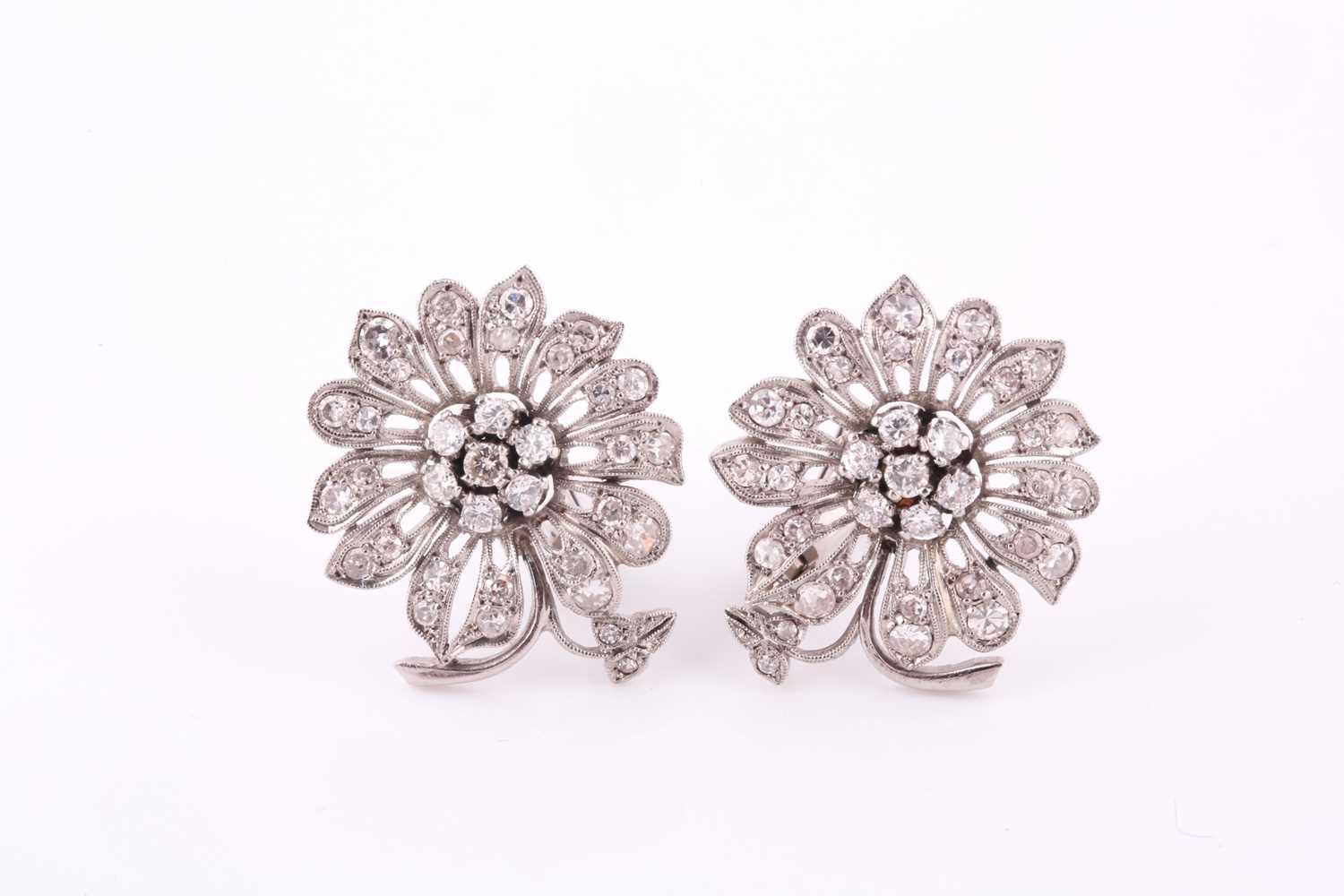 Lot 339 - A pair of stylised flowerhead earclips, mid...