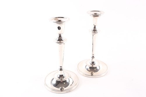 Lot 827 - A pair of Elizabeth II silver candlesticks,...