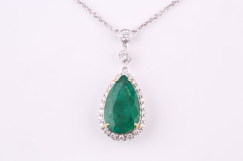 Lot 363 - An emerald and diamond pendant necklace, the...