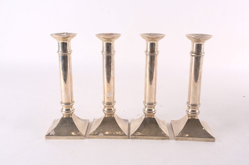 Lot 747 - A set of four sterling silver table...