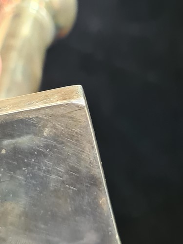 Lot 747 - A set of four sterling silver table...